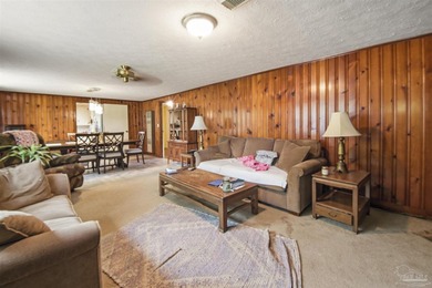 This spacious POOL home is positioned on NEARLY AN ACRE in the - photo 8