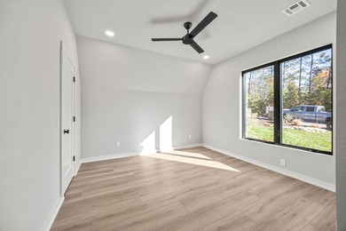 With over 200' of lake frontage and breathtaking views, this - photo 19