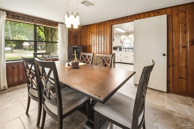 This spacious POOL home is positioned on NEARLY AN ACRE in the - photo 9