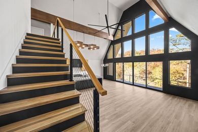 With over 200' of lake frontage and breathtaking views, this - photo 25