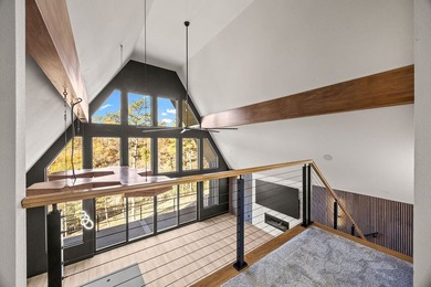With over 200' of lake frontage and breathtaking views, this - photo 26