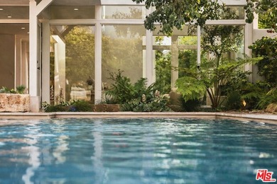 Completely rebuilt architectural residence in the guard-gated - photo 12