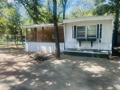 Just a walk to Cedar Creek Lake, this property sits on a - photo 3
