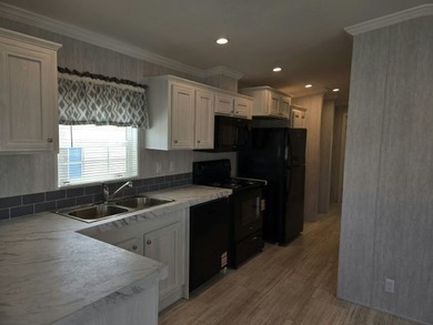 Make your new home in Palm Haven SP, a well-maintained - photo 3