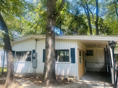 Just a walk to Cedar Creek Lake, this property sits on a - photo 4