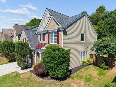 Two-story home featuring an open, light-filled floor plan with - photo 2