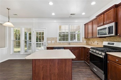 Two-story home featuring an open, light-filled floor plan with - photo 7