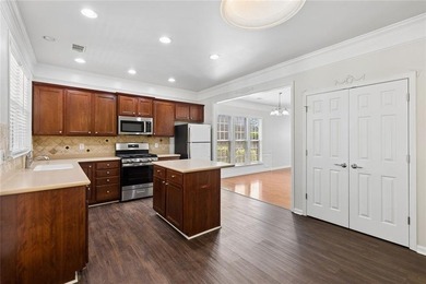 Two-story home featuring an open, light-filled floor plan with - photo 8