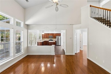 Two-story home featuring an open, light-filled floor plan with - photo 10