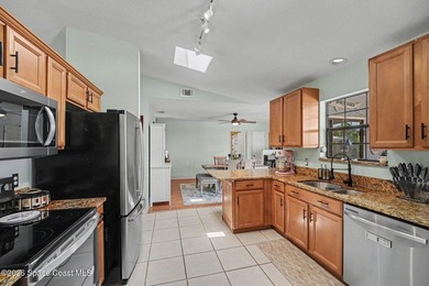 Welcome home to this well-maintained retreat nestled on a quiet - photo 10