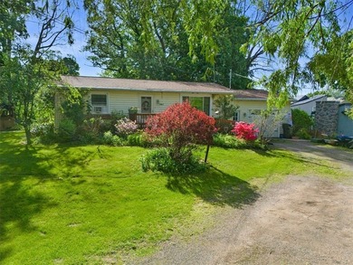 Welcome to this charming lakeside retreat tucked away on a - photo 5
