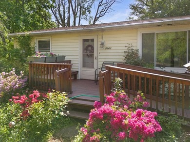 Welcome to this charming lakeside retreat tucked away on a - photo 7