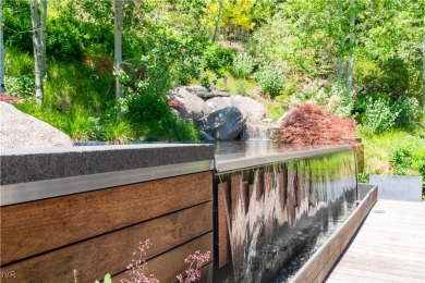 Architectural elegance & absolute privacy define this estate