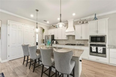 MOVE-IN READY! Stunning 5BR/5 BA. A home in the coveted - photo 3
