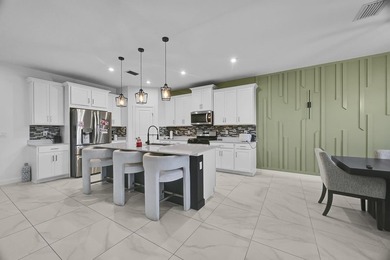 Welcome to this exceptional 4-bedroom, 3-bathroom single-family - photo 11