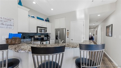 Enjoy incredible lake views from this spacious 4-bedroom, 3-bath