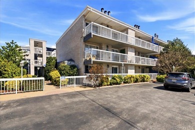 Welcome to this beautifully maintained 2-bedroom, 1.5-bath condo - photo 1