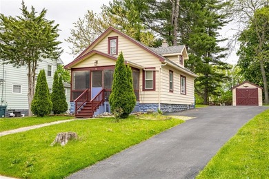 This charming home is nestled in Rochester's beloved Charlotte - photo 1