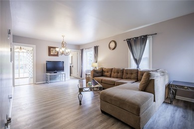 This charming home is nestled in Rochester's beloved Charlotte - photo 3