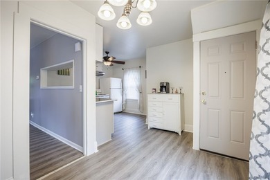 This charming home is nestled in Rochester's beloved Charlotte - photo 5