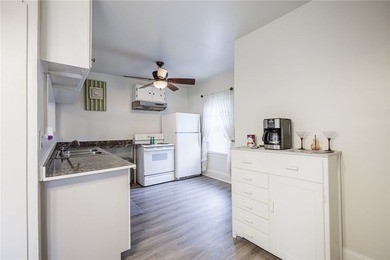 This charming home is nestled in Rochester's beloved Charlotte - photo 6