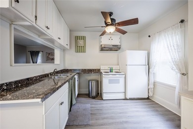 This charming home is nestled in Rochester's beloved Charlotte - photo 7