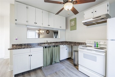 This charming home is nestled in Rochester's beloved Charlotte - photo 8