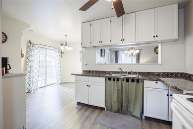 This charming home is nestled in Rochester's beloved Charlotte - photo 9
