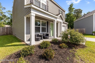 Welcome to 9363 Vineyard Grove Lane NE in Vineyard Grove! Built - photo 5