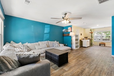 Welcome to 9363 Vineyard Grove Lane NE in Vineyard Grove! Built - photo 6