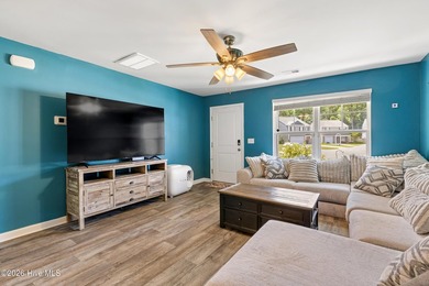 Welcome to 9363 Vineyard Grove Lane NE in Vineyard Grove! Built - photo 7