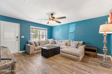 Welcome to 9363 Vineyard Grove Lane NE in Vineyard Grove! Built - photo 9