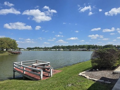 Waterfront living in Silver Dollar Golf and Trap Club, an - photo 8