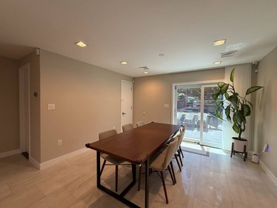1st floor: Open-concept layout with a combined kitchen and - photo 6