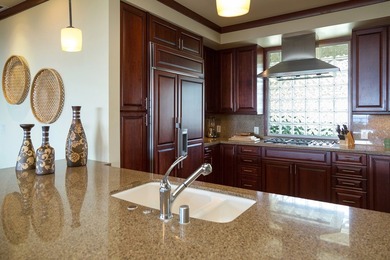Perched above the shimmering coastline within the coveted - photo 12