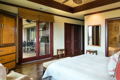 Perched above the shimmering coastline within the coveted - photo 14