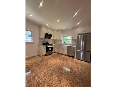 Welcome to this newly renovated, move-in ready residence located - photo 3