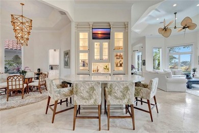 This elegant Sailfish Point estate is ideally positioned on the - photo 12