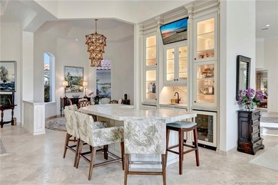 This elegant Sailfish Point estate is ideally positioned on the - photo 13