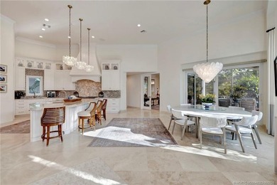 This elegant Sailfish Point estate is ideally positioned on the - photo 16