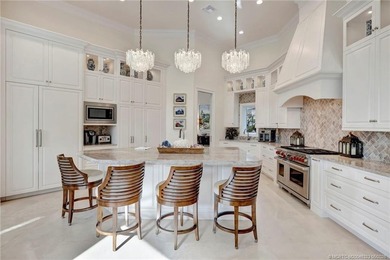 This elegant Sailfish Point estate is ideally positioned on the - photo 18