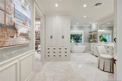 This elegant Sailfish Point estate is ideally positioned on the - photo 28