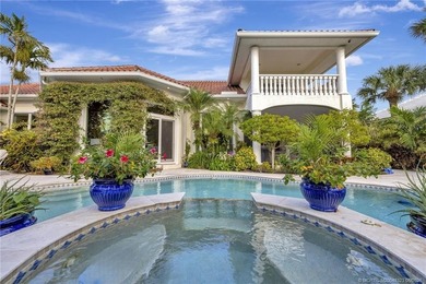 This elegant Sailfish Point estate is ideally positioned on the - photo 49