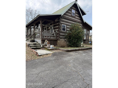 Here is that Beautiful Rustic Log House you have been looking