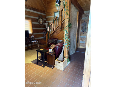 Here is that Beautiful Rustic Log House you have been looking