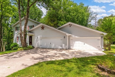 Tucked away on a peaceful one-acre wooded lot, this 4-bedroom, 3 - photo 2