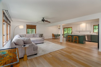 Tucked away on a peaceful one-acre wooded lot, this 4-bedroom, 3 - photo 4