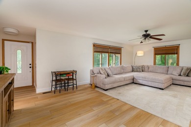 Tucked away on a peaceful one-acre wooded lot, this 4-bedroom, 3 - photo 5