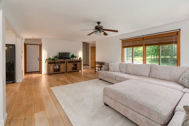 Tucked away on a peaceful one-acre wooded lot, this 4-bedroom, 3 - photo 6