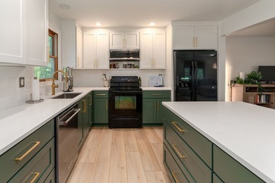 Tucked away on a peaceful one-acre wooded lot, this 4-bedroom, 3 - photo 9